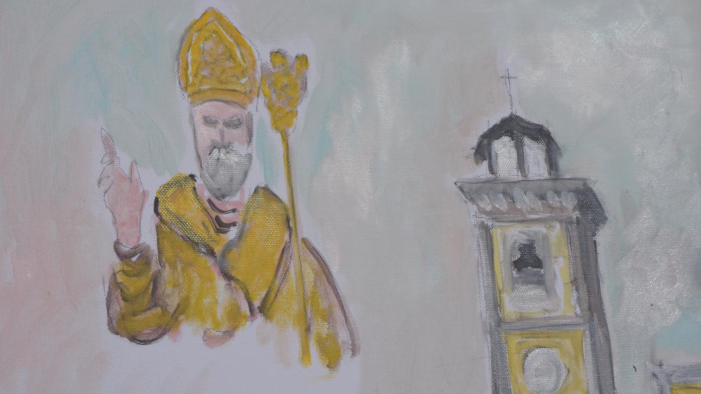 La chiesa e il santo rappresentati da uno degli artisti presenti