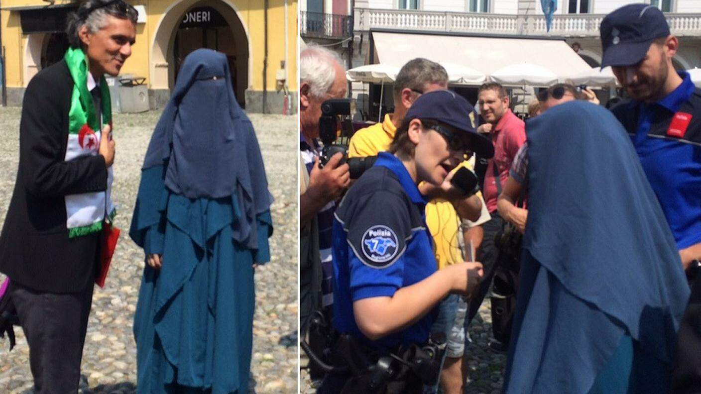 Nekkaz e la donna con il niqab e a destra i poliziotti
