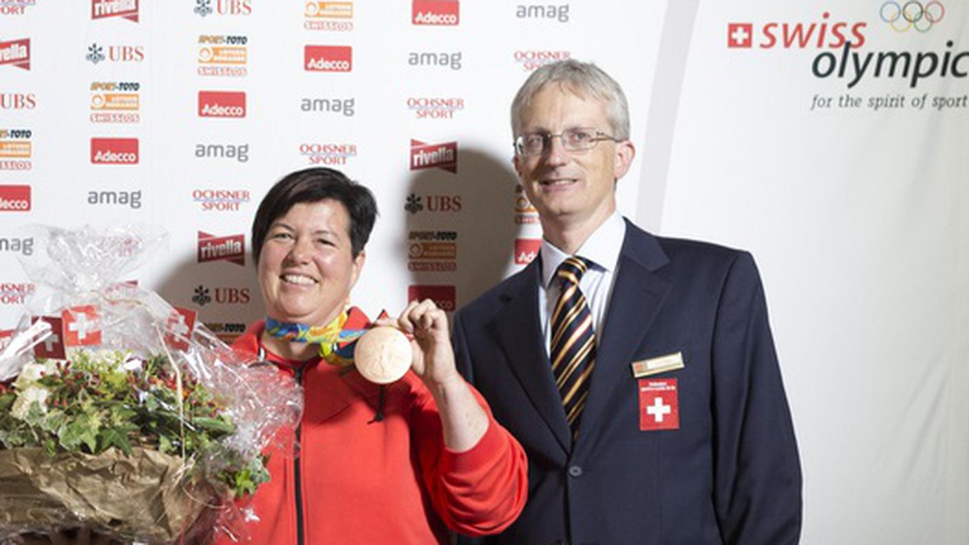 Luca Filippini ritratto con Heidi Diethelm Gerber al rientro da Rio
