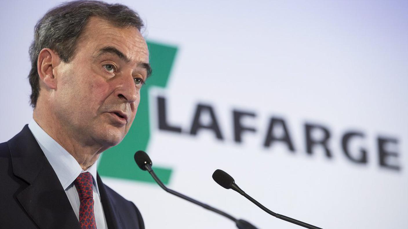 Bruno Lafont, CEO di Lafarge, all'annuncio della fusione con Holcim