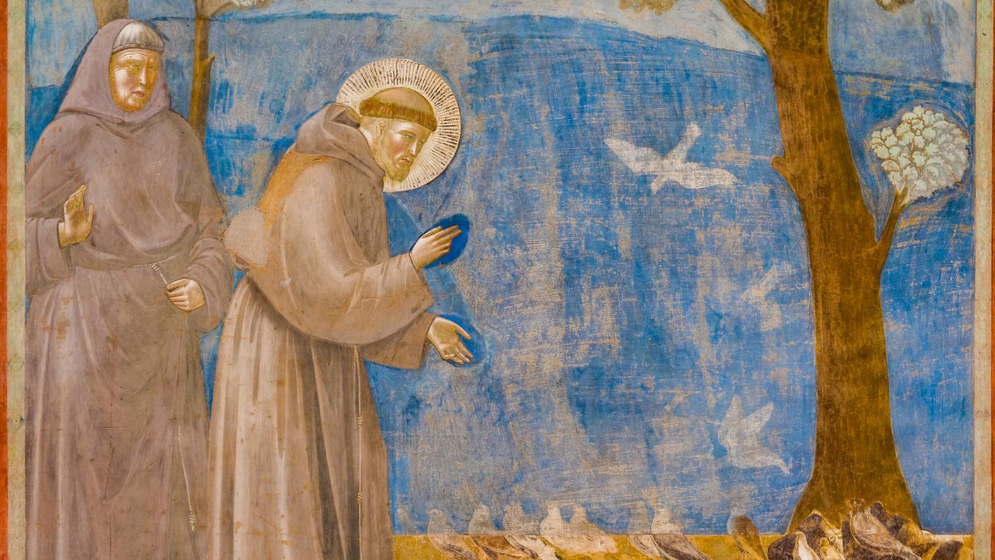 L'affresco di Giotto raffigurante San Francesco che parla agli uccelli nella Basilica di San Francesco nel cuore di Assis