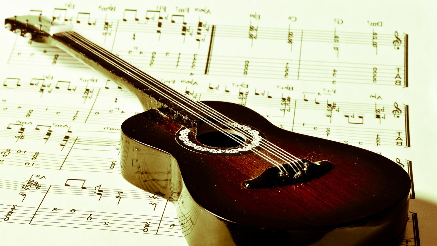classical guitar and musical notes .jpg