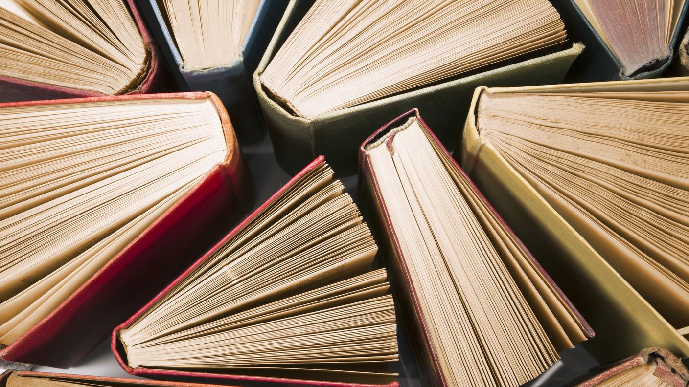 iStock_Book, Reading, Learning, Old, Open