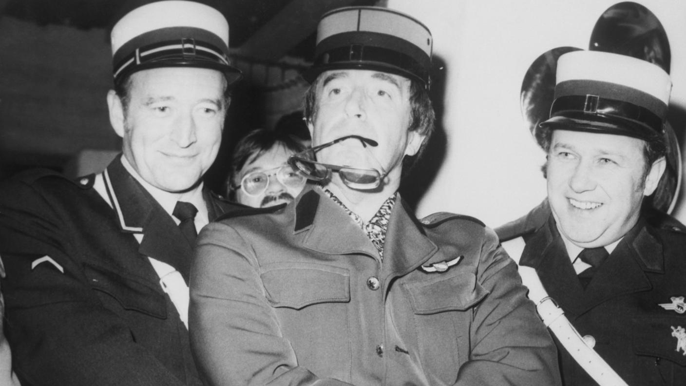 Peter Sellers (al centro), 1975