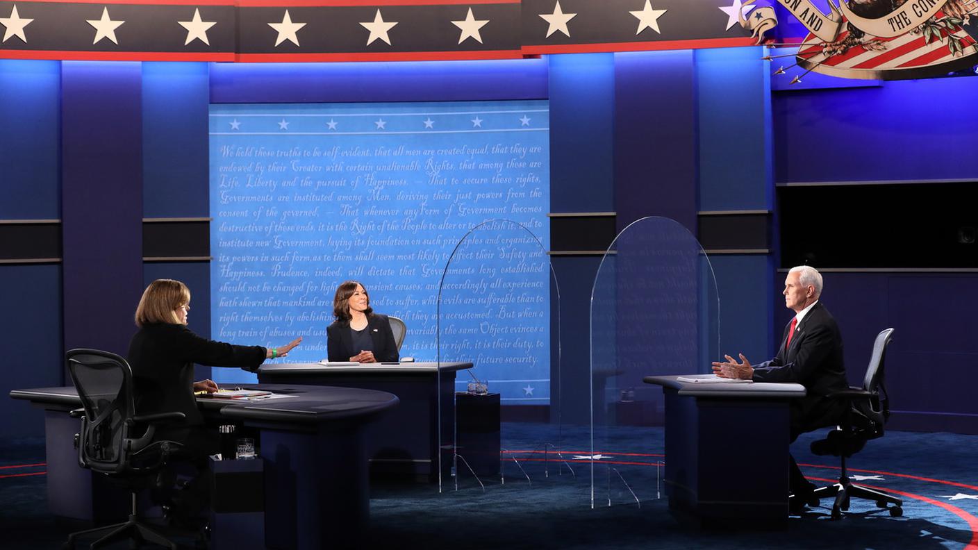 Da sinistra: Susan Page, Kamala Harris e Mike Pence
