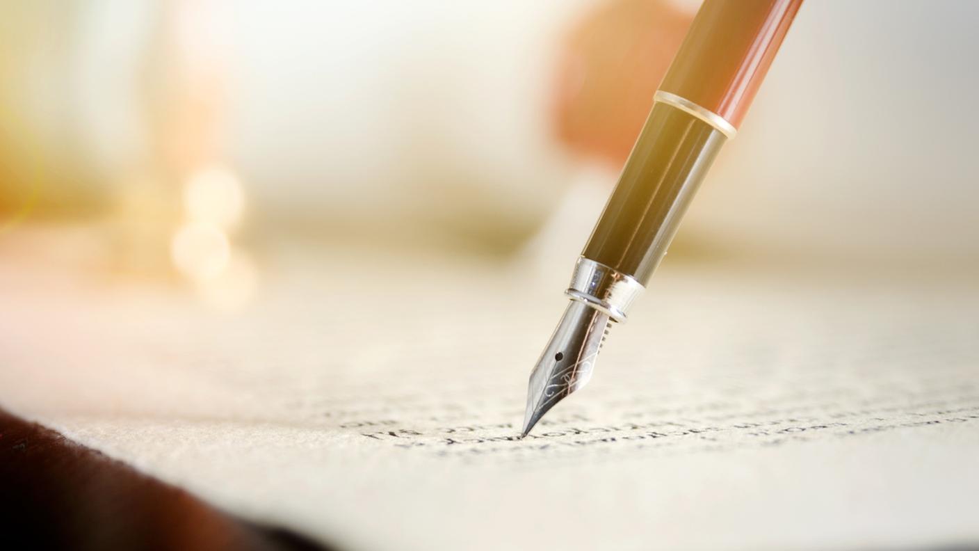 Notary signs legal contract.