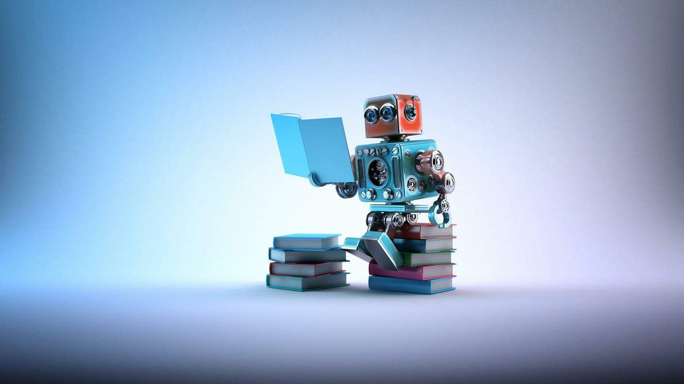 iStock_Robot, Libro, Leggere, Educazione, Imparare