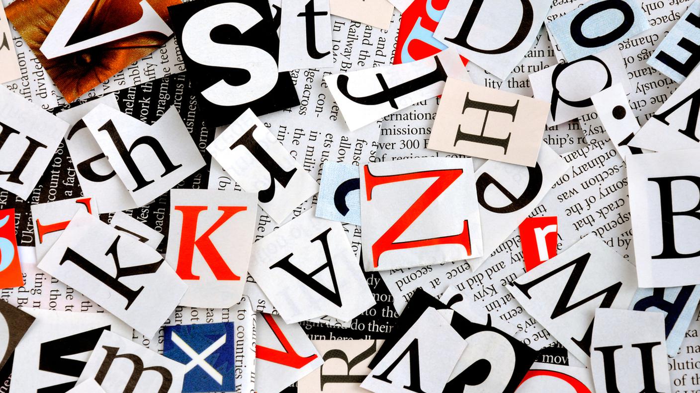 lettere e carta giornale