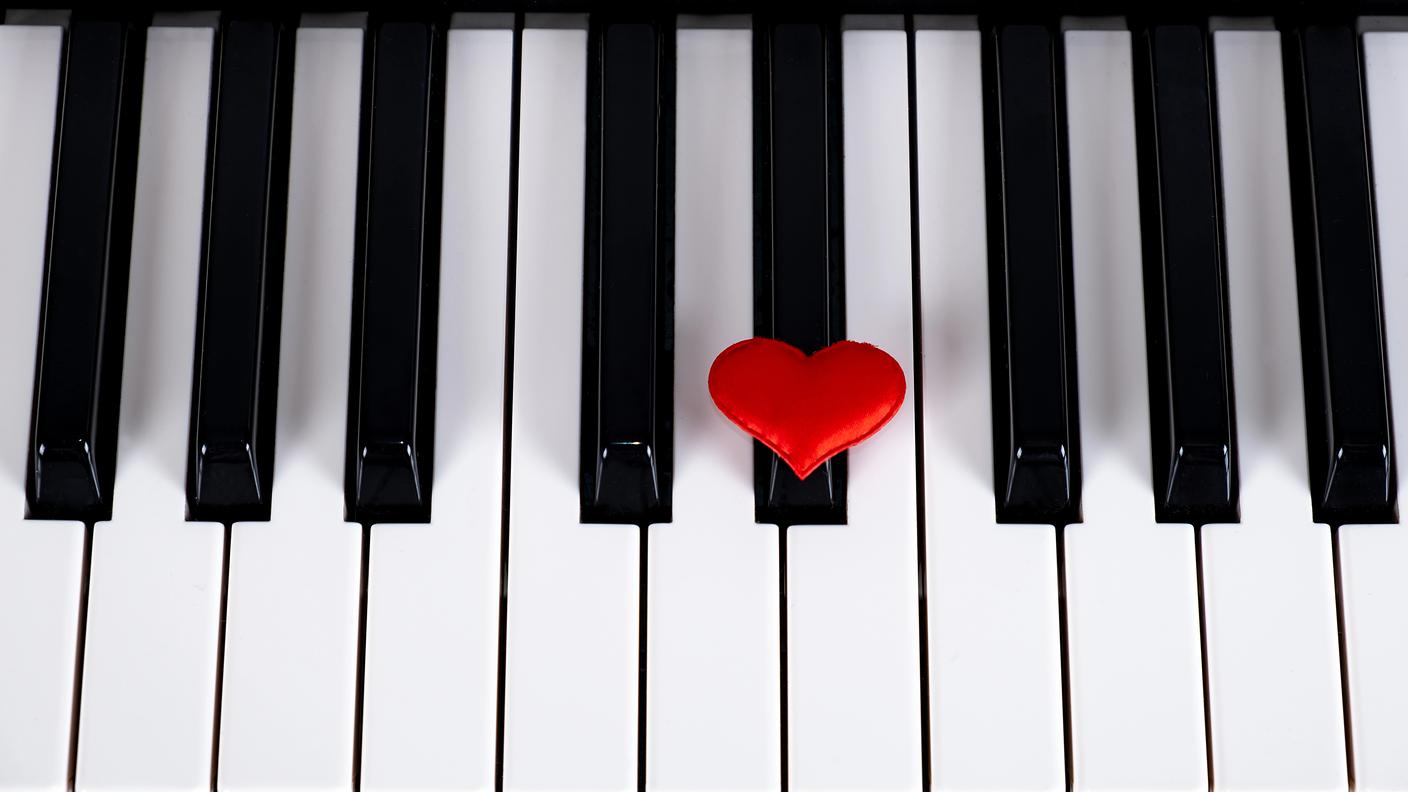 Piano Keyboard with a Red Heart closeup