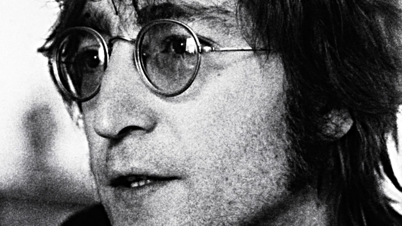 John Lennon; cantante, chitarrista e compositore