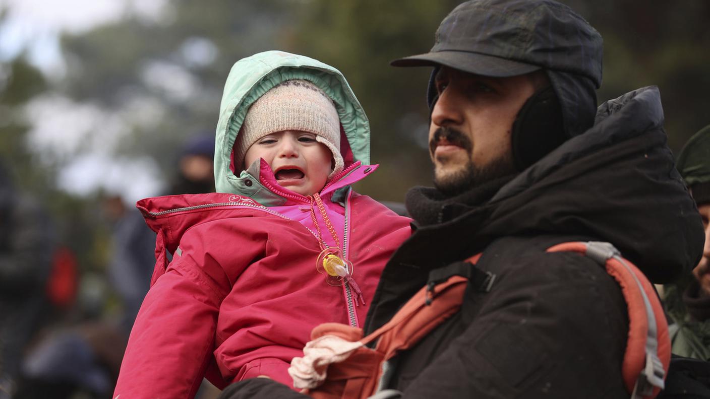 Migranti al confine tra Bielorussia e Polonia