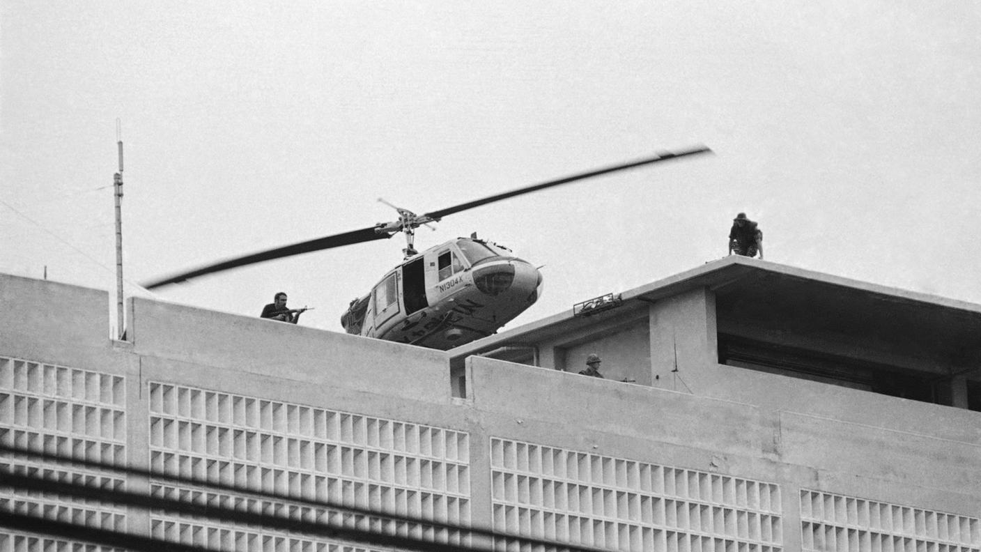 U.S. Marine helicopter takes off from helipad on top of the American Embassy in Saigon, Vietnam, April 30, 1975