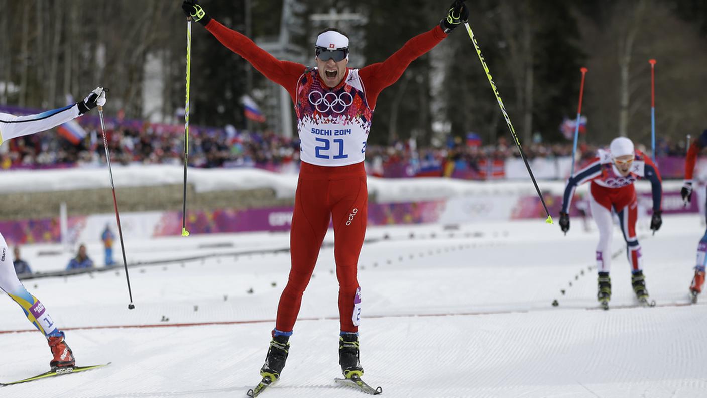 Dario Cologna può esultare: il titolo olimpico è suo!