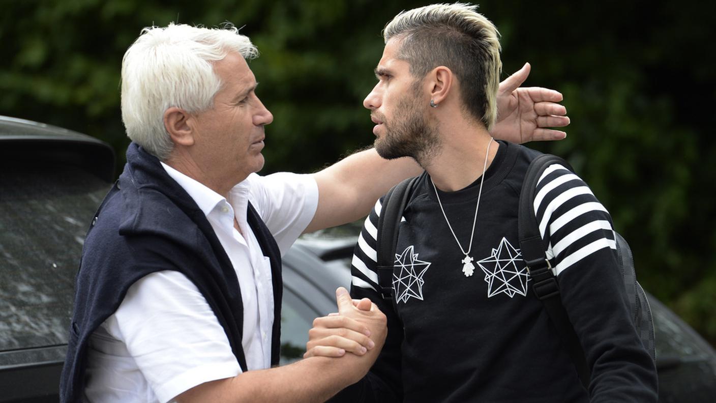 Con il padre all'arrivo a Feusisberg