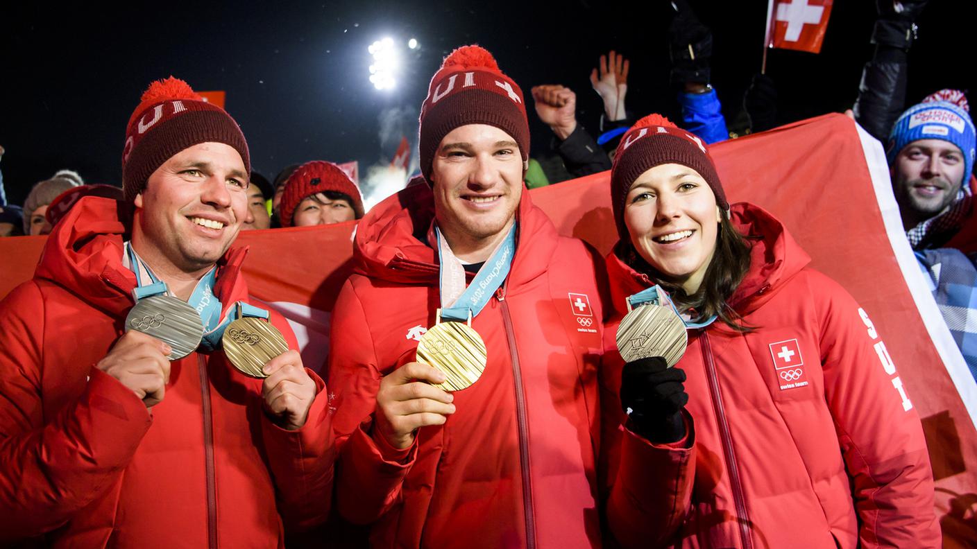 Beat Feuz, Dario Cologna e Wendy Holdener